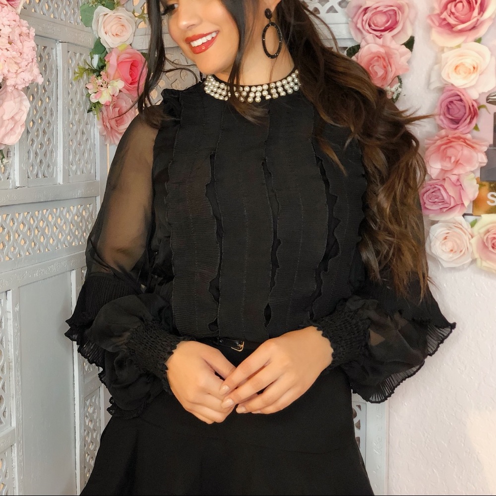 Black ruffle pearl top